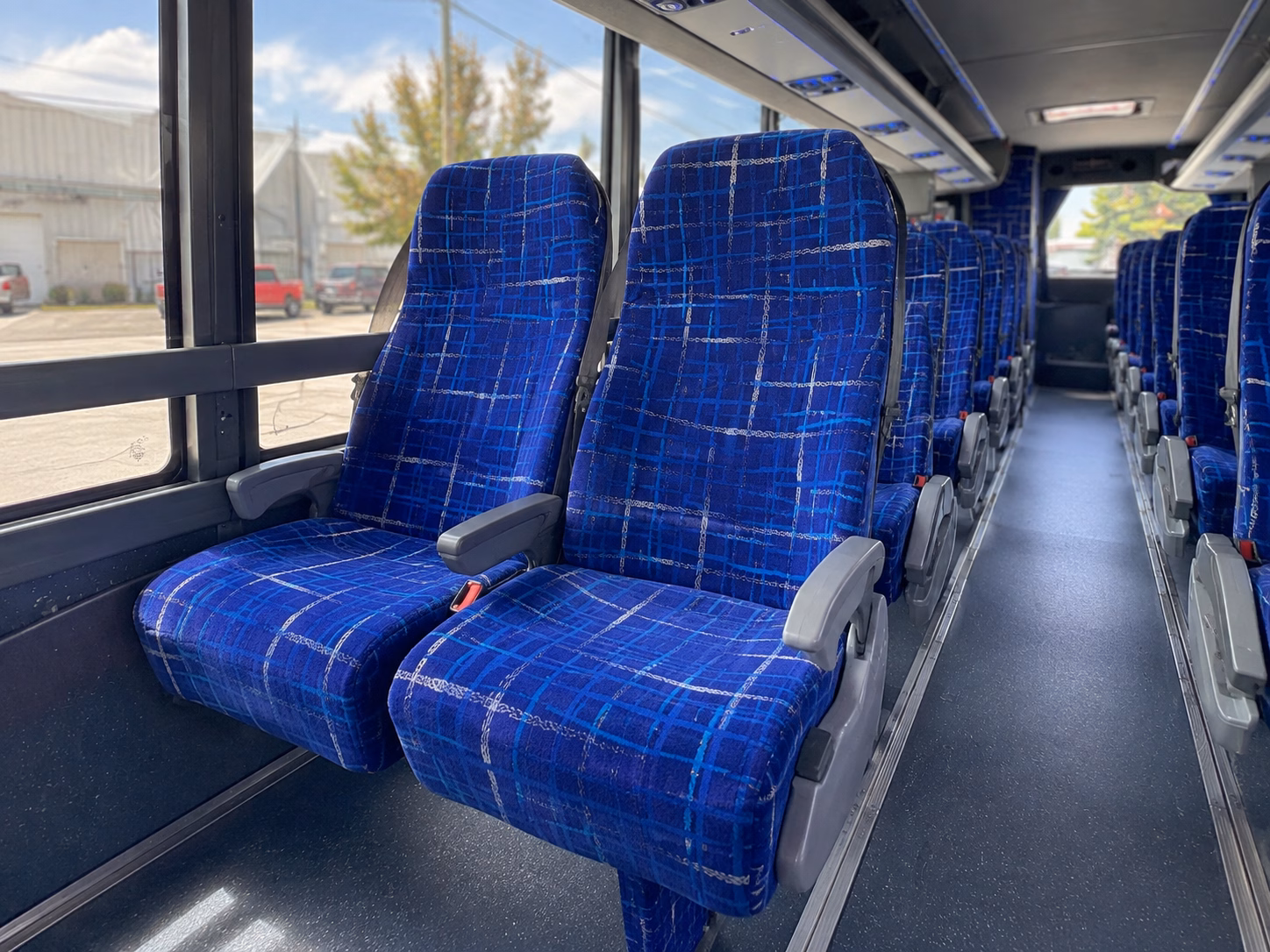 how starting location and deadhead affect charter bus rates in brookline